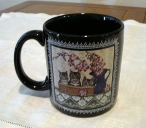 Giftcraft 1996 black coffee mug three cats in basket by Sue Wall cm1314