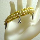 Yellow Awareness Charms on a Beaded Memory Wire Bracelet, Fashion Jewelry