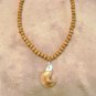 Handmade Beaded Necklace with Fortune Cookie Pendant, brown wood beads,