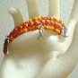 Orange Awareness Ribbon Charms on a Beaded Memory Wire Bracelet, Fashion Jewelry