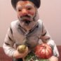 Old man and woman figurines