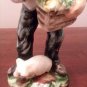 Old man and woman figurines