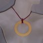 Gold circle pendant
