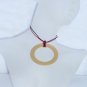 Gold circle pendant