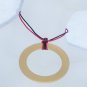 Gold circle pendant