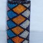 Beaded candle - multi-colored diamonds