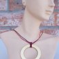 Gold circle pendant