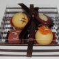 Box of belgian chocolates candles
