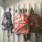 Girl exotic flowers/ feathers book bags