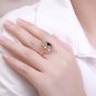 Elegant Oval Created Sapphire Hollow CZ Flower 925 Sterling Silver Ring