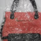 Pink And Black Leather Handbag