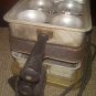 UNIVERSAL LANDERS, FERRY AND CLARK - COOKER - HAS POWER CORD, BUT A COUPLE OF PL