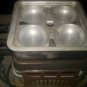 UNIVERSAL LANDERS, FERRY AND CLARK - COOKER - HAS POWER CORD, BUT A COUPLE OF PL