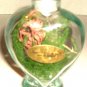 GARDEN IN A HEART SHAPE BOTTLE