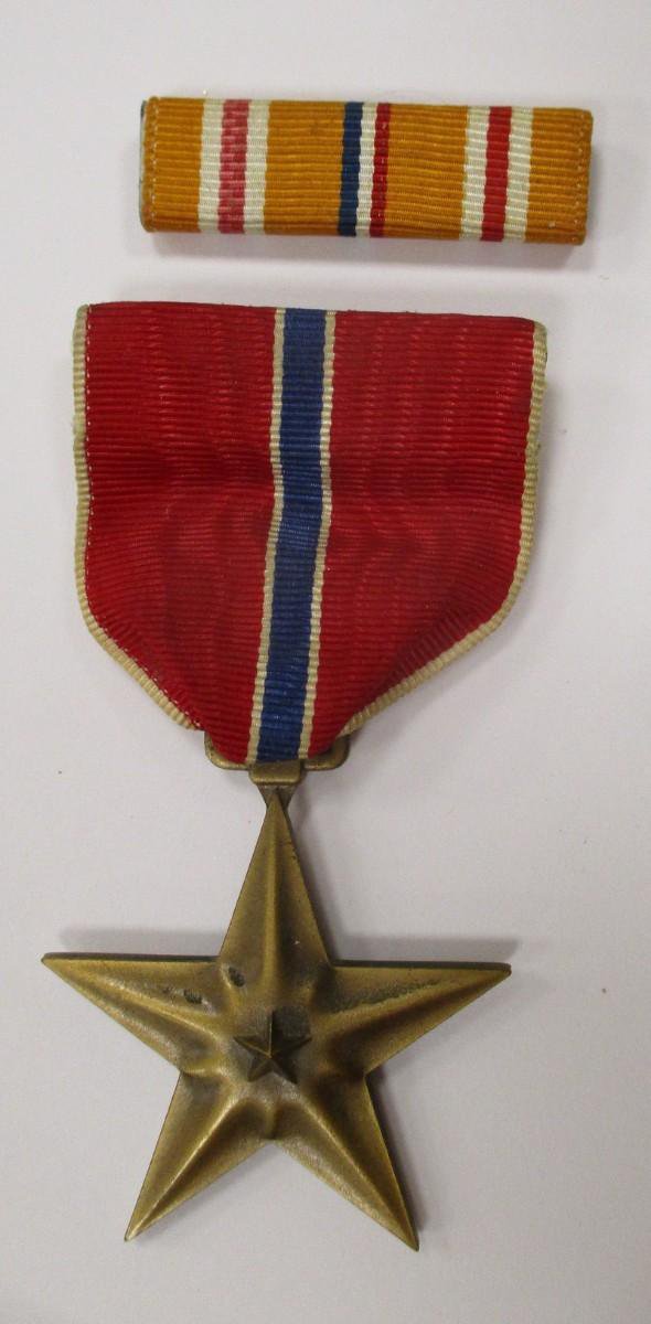 BRONZE STAR Heroic or meritorious achievement service medal
