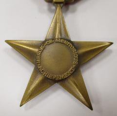 BRONZE STAR Heroic or meritorious achievement service medal