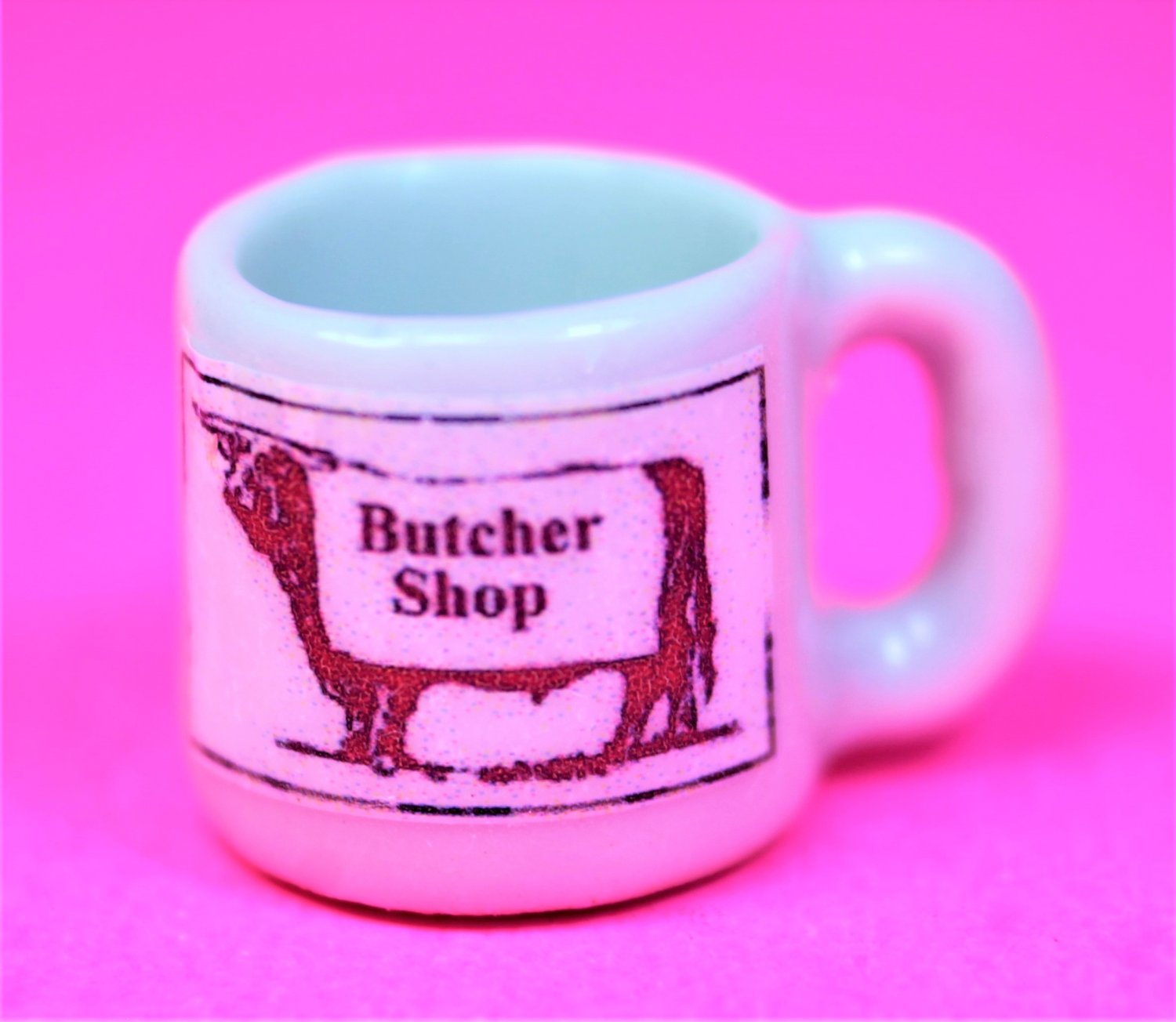 Dollhouse size replica of souvenir butcher coffee mug