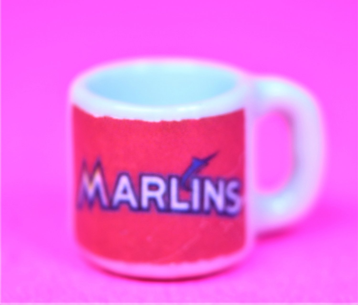 Dollhouse miniature size replica of a Marlin sports coffee mug