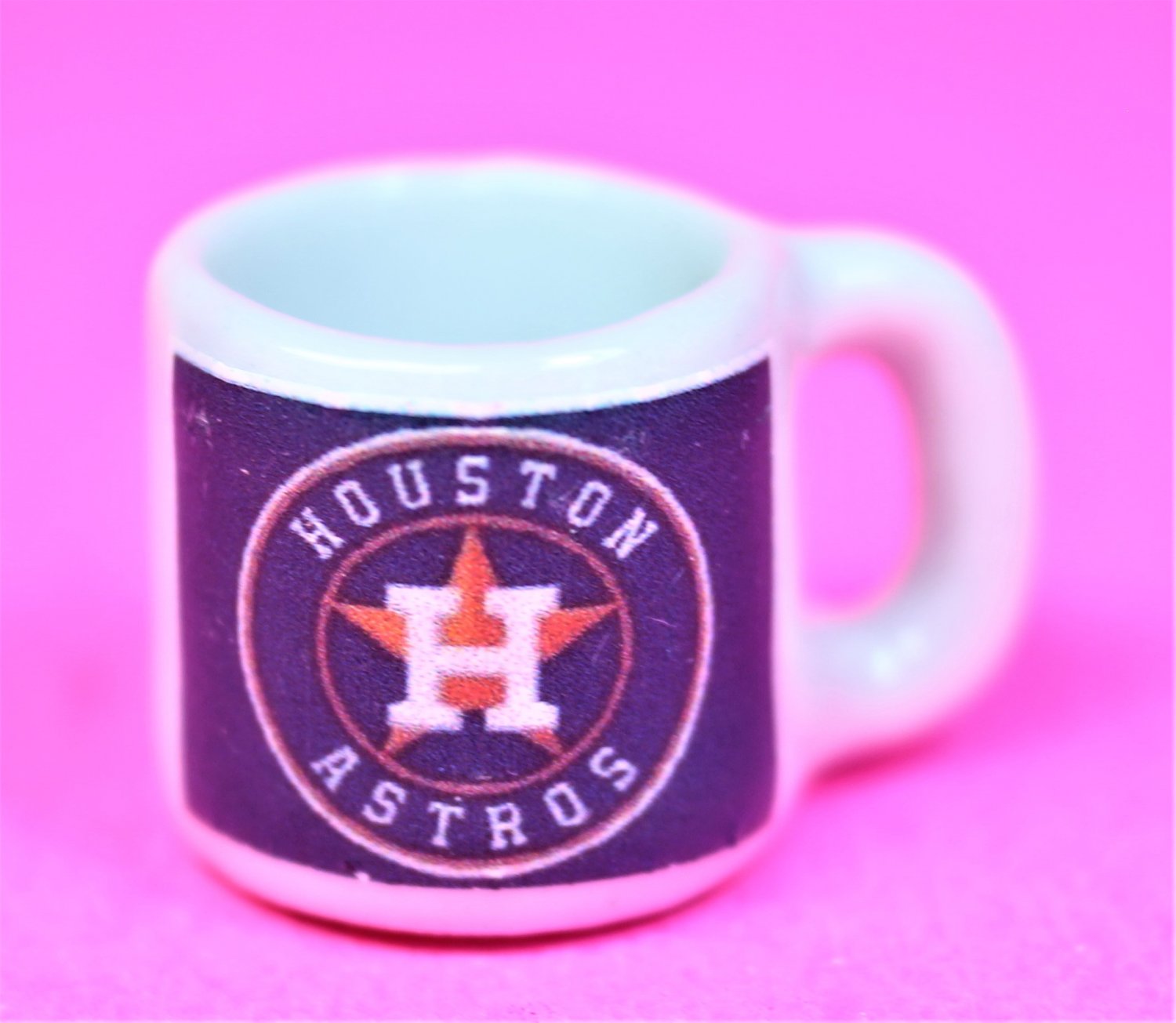 Dollhouse miniature size replica of an Astro sports coffee mug