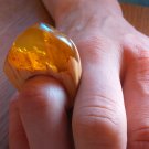 Amber color resin and wood ring