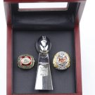 Kansas City Chiefs Superbowl Rings from 1969 and 2019 along with the miniature trophy