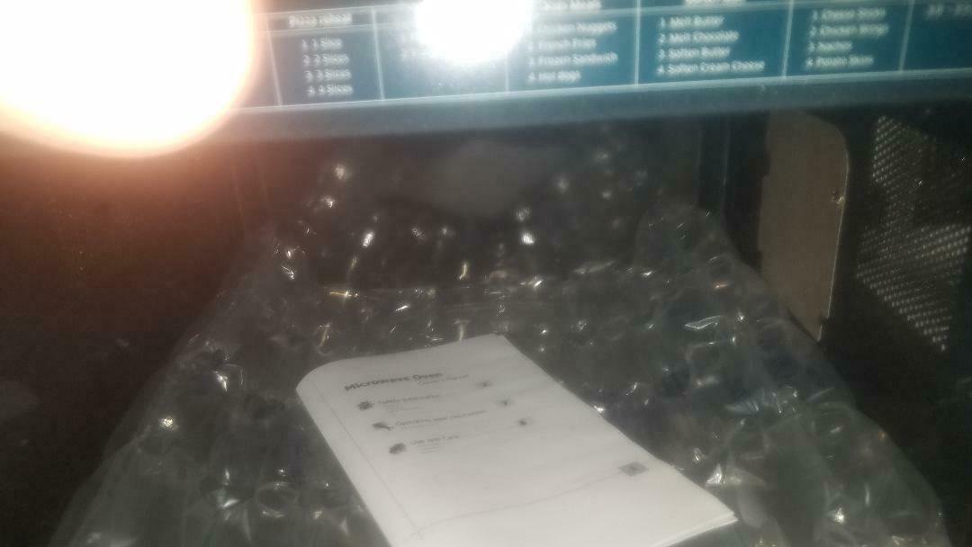 Samsung MG14H3020CM 1.4 cu. ft. Countertop Grill Microwave Oven BENT