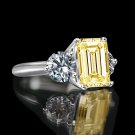 3.5ct Emerald Cut Stone with 1ct Round Stone side, three stones canary ring