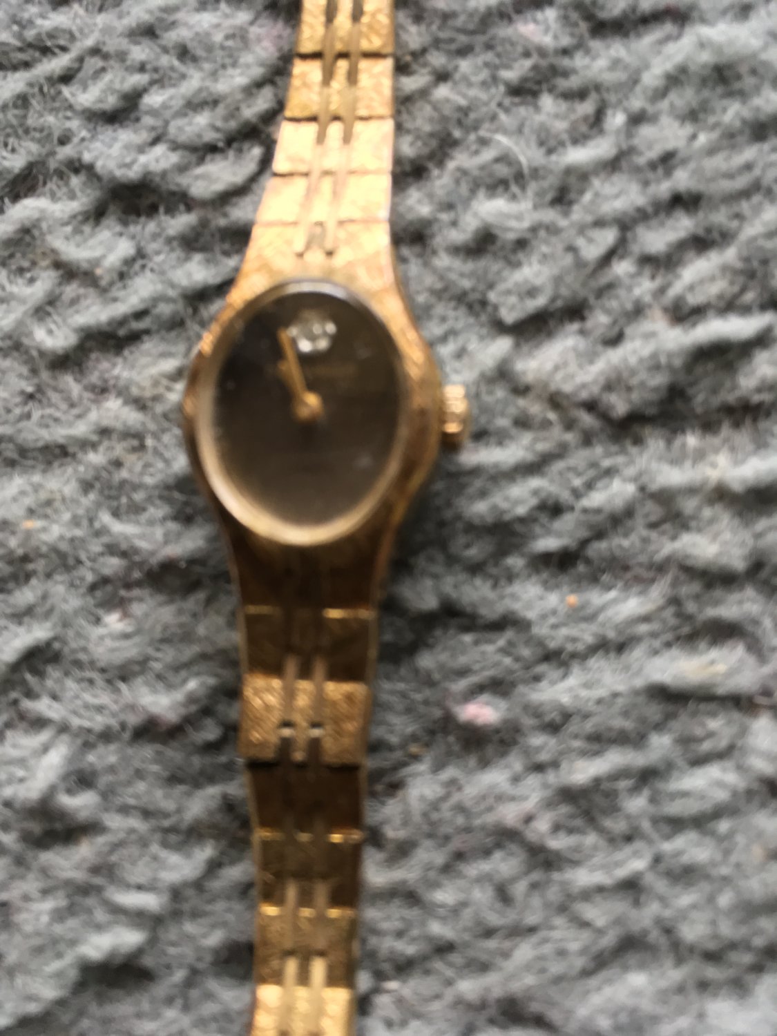 Vintage Ladies Gold-tone Caravelle by Bulova Watch W/diamond.