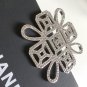 CHANEL Silver Knot CC Crystal Rhinestone Brooch Pin Super Shine Authentic NIB