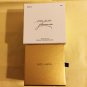 ESTEE LAUDER Pleasures Solid Perfume SPINNING TOP 2006 Holiday Compact NIB