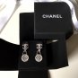 CHANEL Silver Twist CC Stud Blue Clear Crystal Lock Dangle Earrings Dainty