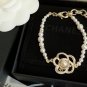 CHANEL Camellia CC Crystal Pearl Bracelet Gold Metal Authentic NIB