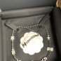 CHANEL Crystal 7 Charm Icons Ruthenium Silver Metal Chain Necklace NIB