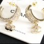 CHANEL Gold Crystal Motif Double Hoop Name Logo CC Dangle Earrings NIB