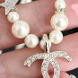 CHANEL Pearl Crystal Star CC Pendant Gold Metal Necklace 2023 NIB