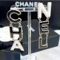 CHANEL Black Cream White Enamel Letter Gold Metal Earrings 24A NIB