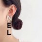 CHANEL Black Cream White Enamel Letter Gold Metal Earrings 24A NIB