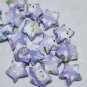Lamb and rainbow patterned purple stars