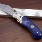 Blue Bone Damascus Folding Knife, Thumb knob, Leather sheath, Engraved Bolster