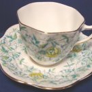 Rosina bone china cup and saucer England green yellow flowers porcelain ruffled gold trim edge