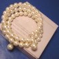 Avon Pearlustre Wrap bracelet 1986 vintage faux pearls cream ivory on stretchable wire, box