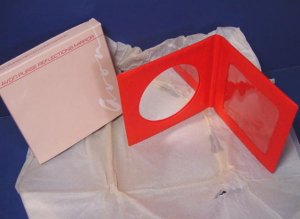 1987 Avon purse reflections mirror and photo frame, red fold-up unused in box vintage