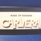 Vintage Made of Genuine Carvera advertising store shelf sign, ivory color black heavy paperweight