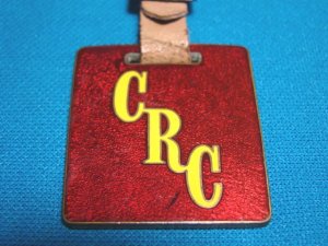 Crutcher Rolfs Cummings CRC Houston pocket watch fob vintage advertising enamel brass 1930s