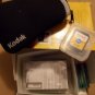 Open box Kodak Memory & Charger Kit Battery Bag 2GB Digital Camera Z915 C142 AA