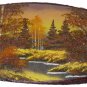 Picture "Amber Sunset" on a cut of a tree