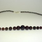 Pomegranate necklace in the central part (54 cm)