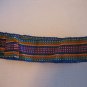 Vintage Women's Woven Multi-Color Tie Belt with Dolls in Front 60 in.L x 2in.W