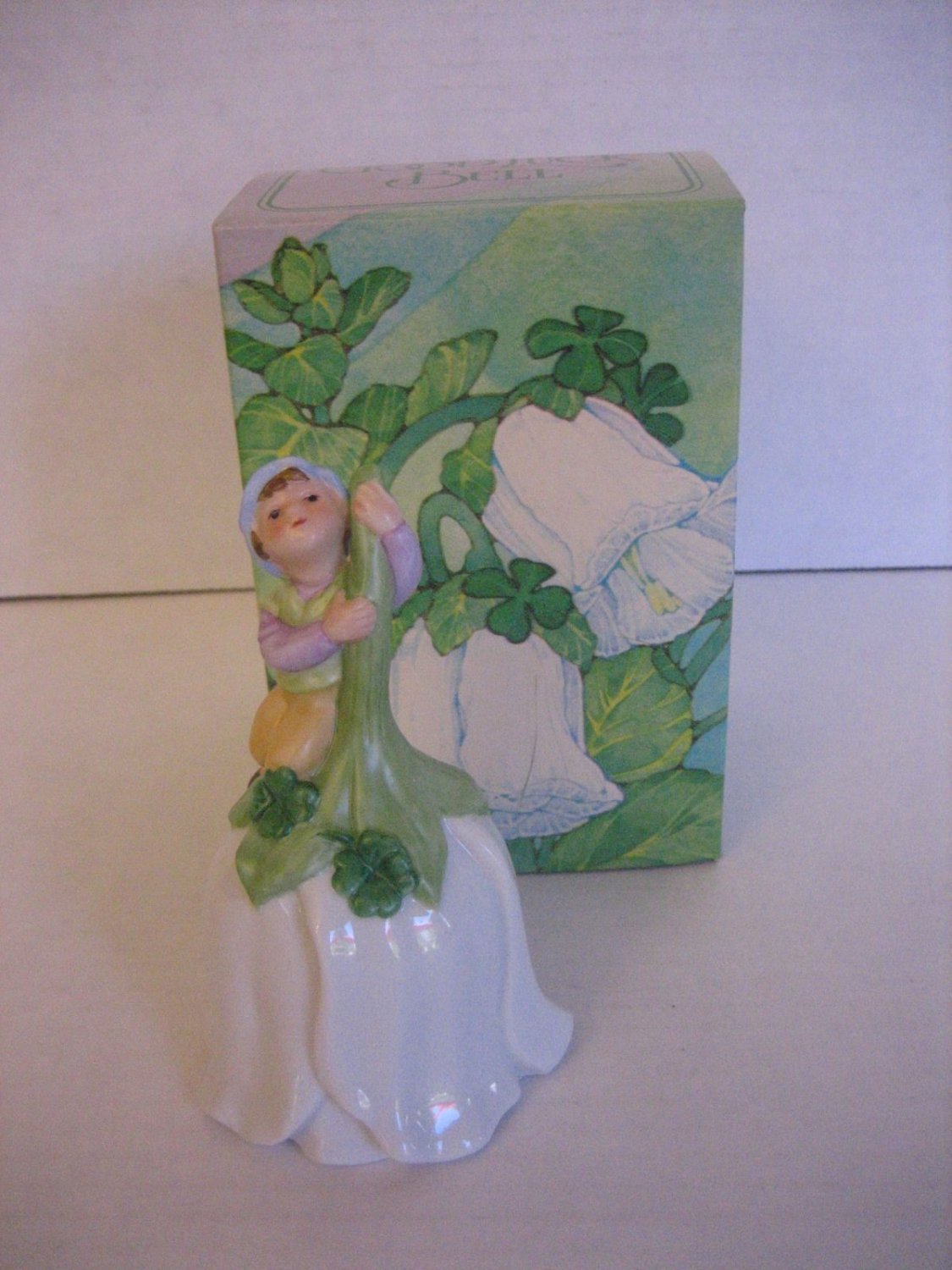 Vintage Avon Porcelain White & Green Good Luck Leprechaun Bell 1983 NIB 5 in.T