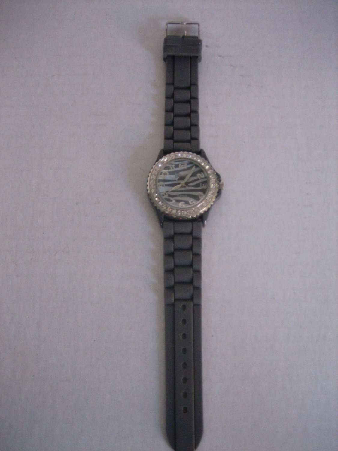 Geneva Women's Rhinestone & Zebra Round Face Grey Rubber Wrist Watch Pre-Owned
